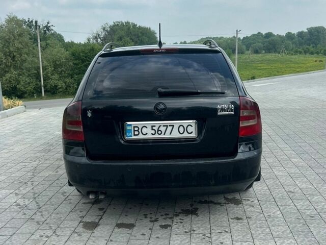 Черный Шкода Октавия, объемом двигателя 1.98 л и пробегом 306 тыс. км за 5900 $, фото 2 на Automoto.ua