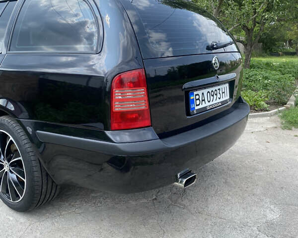 Черный Шкода Октавия, объемом двигателя 1.8 л и пробегом 292 тыс. км за 5000 $, фото 3 на Automoto.ua