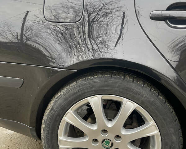 Черный Шкода Октавия, объемом двигателя 2 л и пробегом 326 тыс. км за 7250 $, фото 10 на Automoto.ua