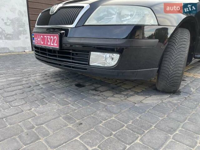 Черный Шкода Октавия, объемом двигателя 1.6 л и пробегом 275 тыс. км за 4999 $, фото 20 на Automoto.ua