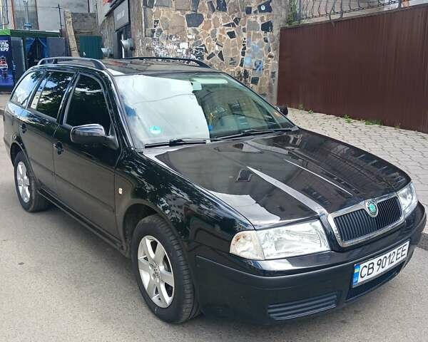 Черный Шкода Октавия, объемом двигателя 1.6 л и пробегом 248 тыс. км за 5000 $, фото 2 на Automoto.ua