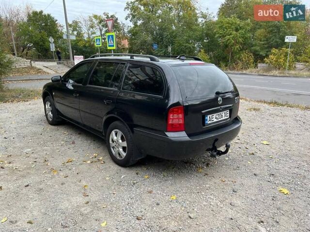 Черный Шкода Октавия, объемом двигателя 1.6 л и пробегом 270 тыс. км за 5800 $, фото 4 на Automoto.ua