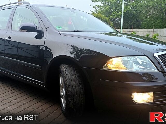 Черный Шкода Октавия, объемом двигателя 1.6 л и пробегом 220 тыс. км за 6500 $, фото 1 на Automoto.ua