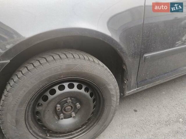 Черный Шкода Октавия, объемом двигателя 1.6 л и пробегом 303 тыс. км за 3900 $, фото 11 на Automoto.ua