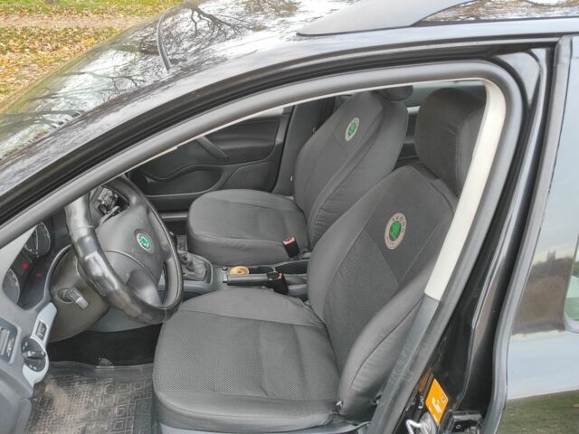 Черный Шкода Октавия, объемом двигателя 1.9 л и пробегом 312 тыс. км за 5750 $, фото 5 на Automoto.ua