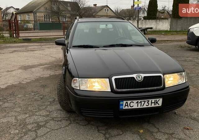 Черный Шкода Октавия, объемом двигателя 1.6 л и пробегом 206 тыс. км за 6300 $, фото 5 на Automoto.ua