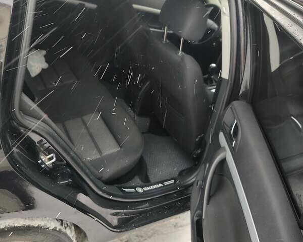 Черный Шкода Октавия, объемом двигателя 2 л и пробегом 359 тыс. км за 6050 $, фото 8 на Automoto.ua