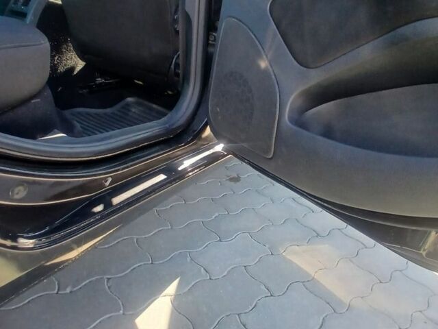 Черный Шкода Октавия, объемом двигателя 1.6 л и пробегом 210 тыс. км за 5500 $, фото 4 на Automoto.ua