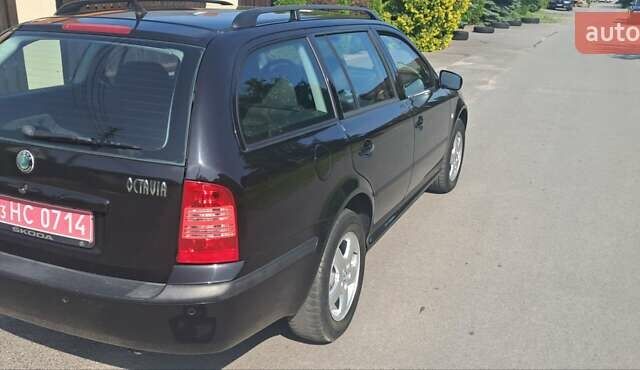 Черный Шкода Октавия, объемом двигателя 1.6 л и пробегом 209 тыс. км за 5800 $, фото 7 на Automoto.ua