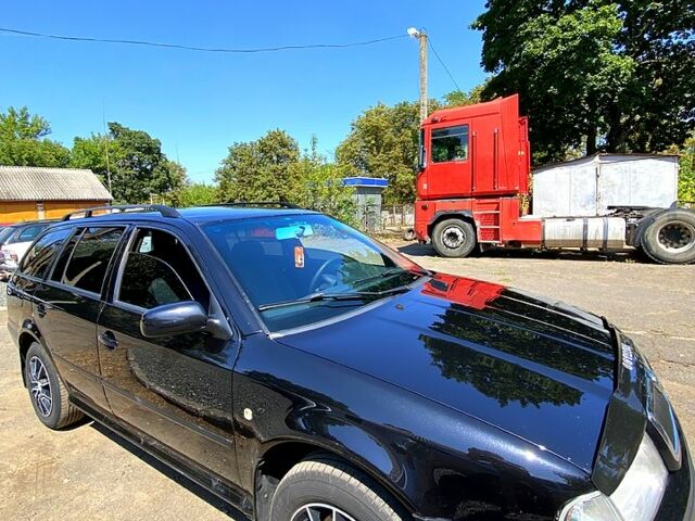 Чорний Шкода Октавія, об'ємом двигуна 1.6 л та пробігом 300 тис. км за 4999 $, фото 1 на Automoto.ua