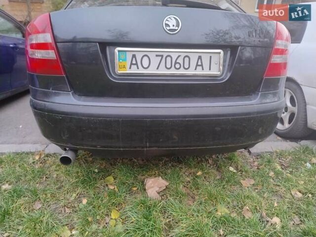 Черный Шкода Октавия, объемом двигателя 1.6 л и пробегом 303 тыс. км за 3900 $, фото 9 на Automoto.ua