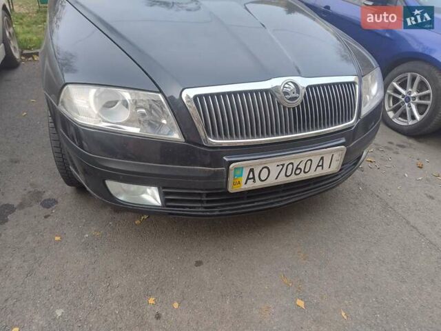 Черный Шкода Октавия, объемом двигателя 1.6 л и пробегом 303 тыс. км за 3900 $, фото 13 на Automoto.ua