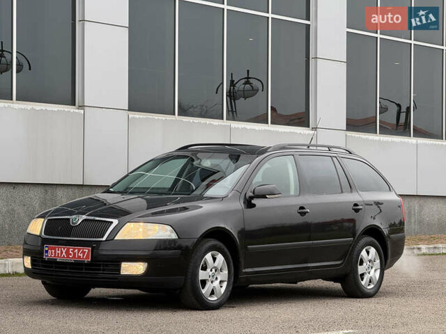 Черный Шкода Октавия, объемом двигателя 1.6 л и пробегом 211 тыс. км за 6500 $, фото 8 на Automoto.ua