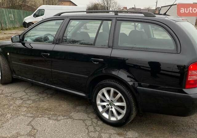 Черный Шкода Октавия, объемом двигателя 1.6 л и пробегом 206 тыс. км за 6300 $, фото 2 на Automoto.ua