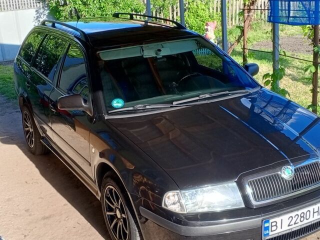 Черный Шкода Октавия, объемом двигателя 1.6 л и пробегом 2 тыс. км за 6000 $, фото 2 на Automoto.ua