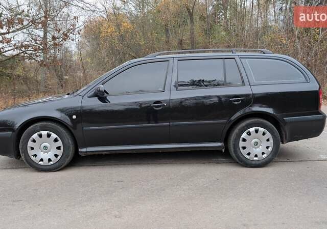 Чорний Шкода Октавія, об'ємом двигуна 1.6 л та пробігом 144 тис. км за 6999 $, фото 6 на Automoto.ua
