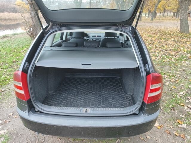 Черный Шкода Октавия, объемом двигателя 1.9 л и пробегом 312 тыс. км за 5750 $, фото 3 на Automoto.ua