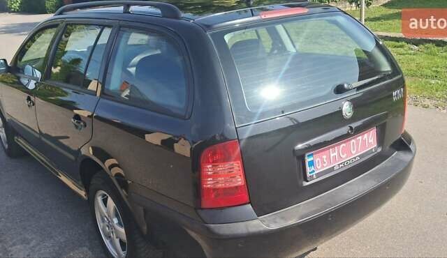 Черный Шкода Октавия, объемом двигателя 1.6 л и пробегом 209 тыс. км за 5800 $, фото 4 на Automoto.ua