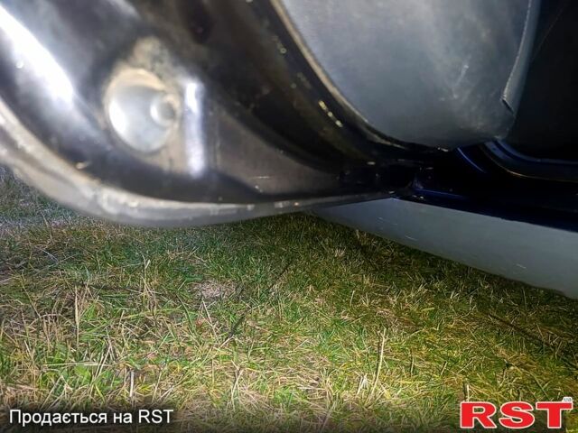 Черный Шкода Октавия, объемом двигателя 2 л и пробегом 315 тыс. км за 6200 $, фото 6 на Automoto.ua