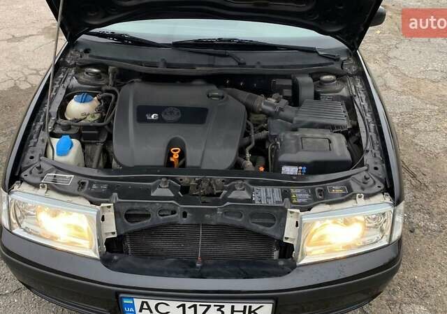 Черный Шкода Октавия, объемом двигателя 1.6 л и пробегом 206 тыс. км за 6300 $, фото 20 на Automoto.ua