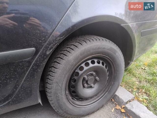 Черный Шкода Октавия, объемом двигателя 1.6 л и пробегом 303 тыс. км за 3900 $, фото 10 на Automoto.ua