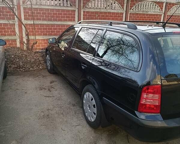 Чорний Шкода Октавія, об'ємом двигуна 1.6 л та пробігом 211 тис. км за 5300 $, фото 1 на Automoto.ua