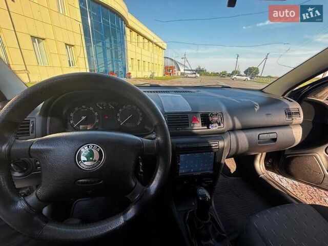 Чорний Шкода Октавія, об'ємом двигуна 1.6 л та пробігом 218 тис. км за 6100 $, фото 4 на Automoto.ua