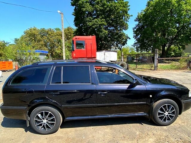 Чорний Шкода Октавія, об'ємом двигуна 1.6 л та пробігом 300 тис. км за 4999 $, фото 7 на Automoto.ua