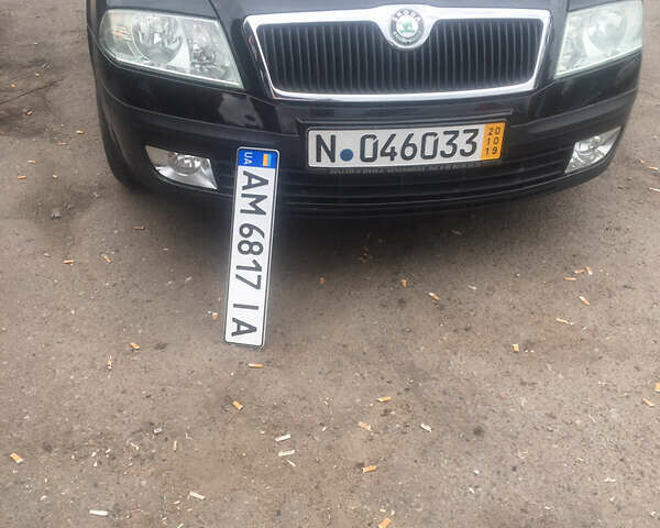Черный Шкода Октавия, объемом двигателя 1.6 л и пробегом 223 тыс. км за 6300 $, фото 1 на Automoto.ua