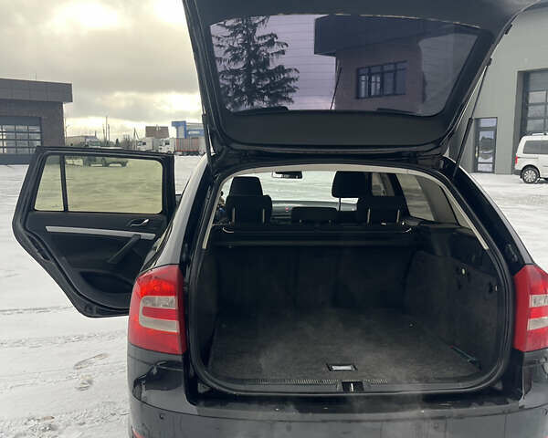 Чорний Шкода Октавія, об'ємом двигуна 2 л та пробігом 327 тис. км за 5750 $, фото 7 на Automoto.ua