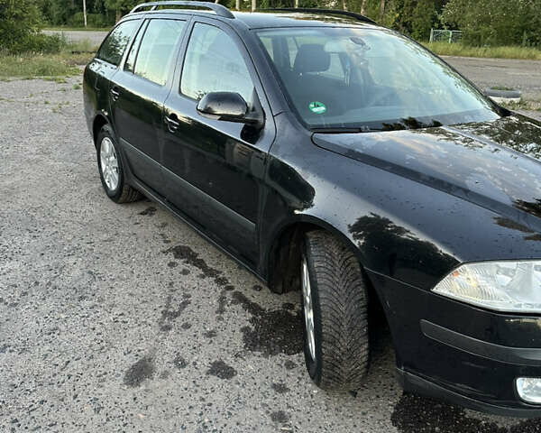 Чорний Шкода Октавія, об'ємом двигуна 2 л та пробігом 219 тис. км за 6500 $, фото 1 на Automoto.ua