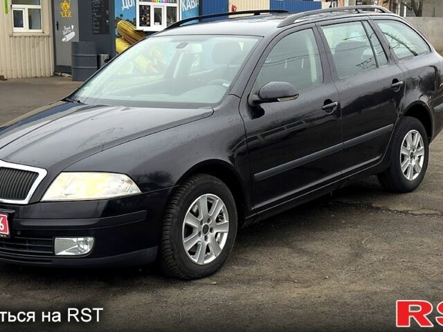 Черный Шкода Октавия, объемом двигателя 20 л и пробегом 185 тыс. км за 5800 $, фото 1 на Automoto.ua