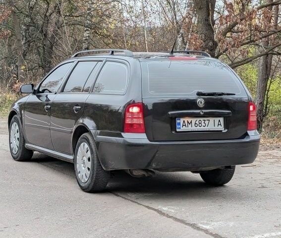 Чорний Шкода Октавія, об'ємом двигуна 1.6 л та пробігом 144 тис. км за 6999 $, фото 5 на Automoto.ua