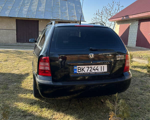 Черный Шкода Октавия, объемом двигателя 1.6 л и пробегом 209 тыс. км за 5999 $, фото 7 на Automoto.ua