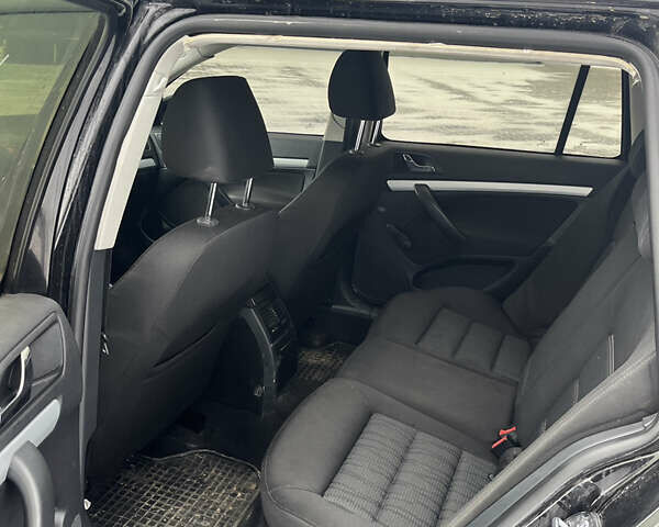 Чорний Шкода Октавія, об'ємом двигуна 2 л та пробігом 327 тис. км за 5750 $, фото 8 на Automoto.ua