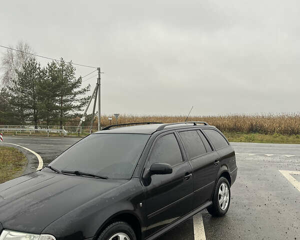 Чорний Шкода Октавія, об'ємом двигуна 1.6 л та пробігом 265 тис. км за 5800 $, фото 1 на Automoto.ua