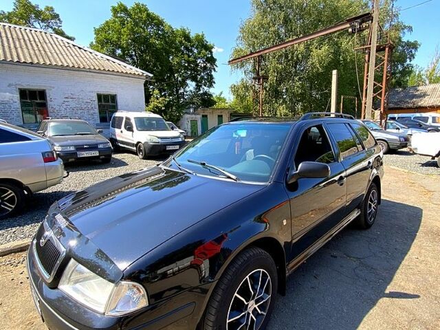 Чорний Шкода Октавія, об'ємом двигуна 1.6 л та пробігом 300 тис. км за 4999 $, фото 3 на Automoto.ua