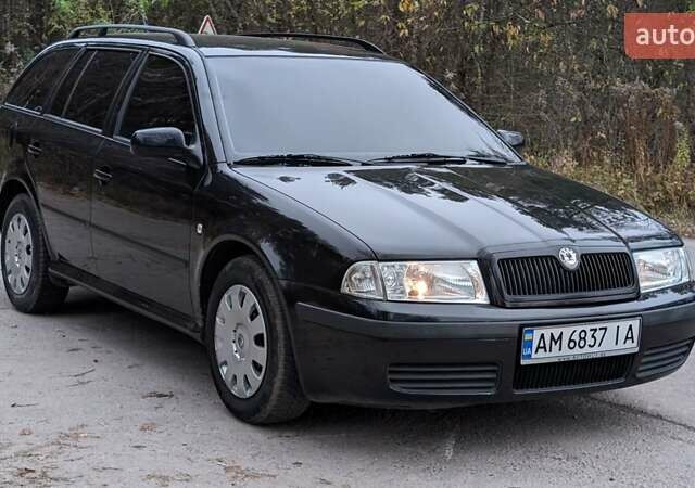 Чорний Шкода Октавія, об'ємом двигуна 1.6 л та пробігом 144 тис. км за 6999 $, фото 2 на Automoto.ua