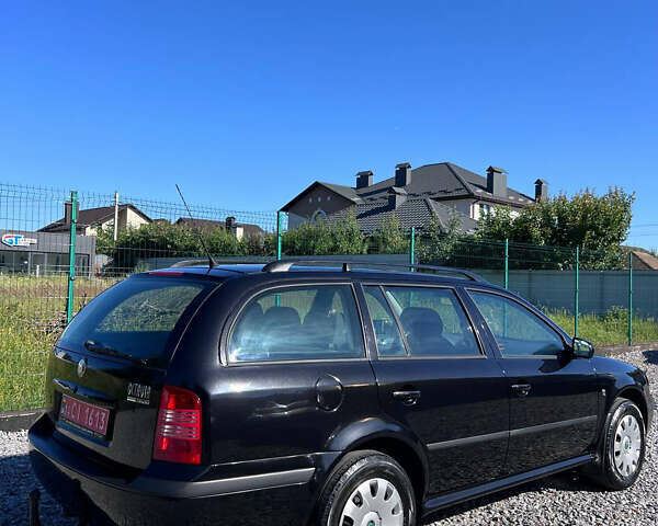 Черный Шкода Октавия, объемом двигателя 1.6 л и пробегом 234 тыс. км за 5200 $, фото 5 на Automoto.ua