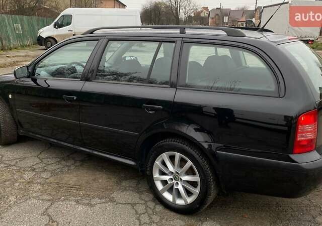 Черный Шкода Октавия, объемом двигателя 1.6 л и пробегом 206 тыс. км за 6300 $, фото 4 на Automoto.ua