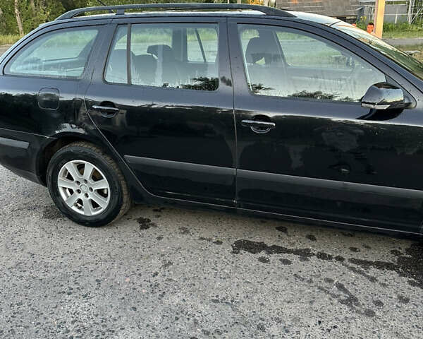 Чорний Шкода Октавія, об'ємом двигуна 2 л та пробігом 219 тис. км за 6500 $, фото 2 на Automoto.ua