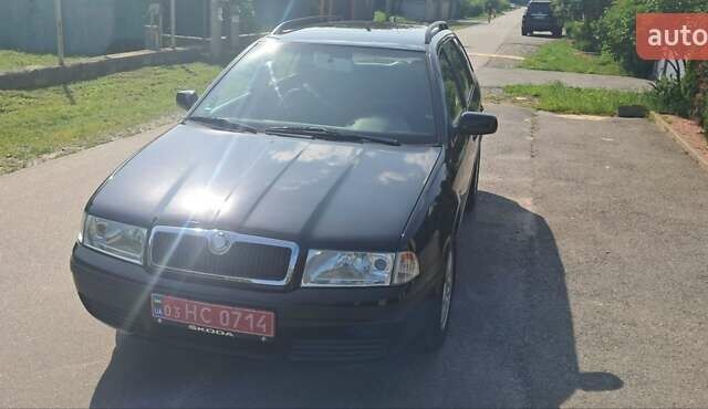 Черный Шкода Октавия, объемом двигателя 1.6 л и пробегом 209 тыс. км за 5800 $, фото 8 на Automoto.ua