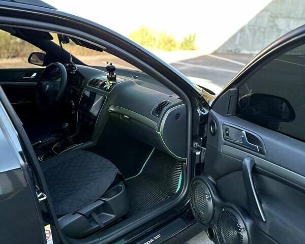 Чорний Шкода Октавія, об'ємом двигуна 2 л та пробігом 451 тис. км за 8200 $, фото 4 на Automoto.ua