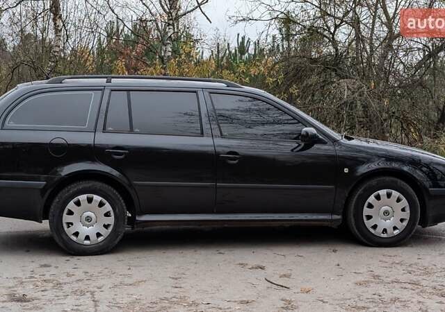 Чорний Шкода Октавія, об'ємом двигуна 1.6 л та пробігом 144 тис. км за 6999 $, фото 7 на Automoto.ua