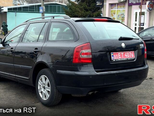 Черный Шкода Октавия, объемом двигателя 20 л и пробегом 185 тыс. км за 5800 $, фото 2 на Automoto.ua