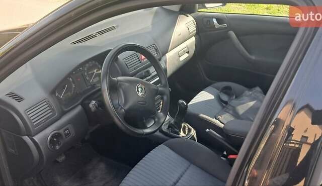 Черный Шкода Октавия, объемом двигателя 1.6 л и пробегом 209 тыс. км за 5800 $, фото 3 на Automoto.ua