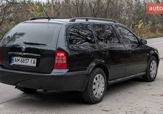 Чорний Шкода Октавія, об'ємом двигуна 1.6 л та пробігом 144 тис. км за 6999 $, фото 4 на Automoto.ua