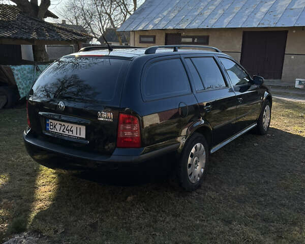 Черный Шкода Октавия, объемом двигателя 1.6 л и пробегом 209 тыс. км за 5999 $, фото 9 на Automoto.ua