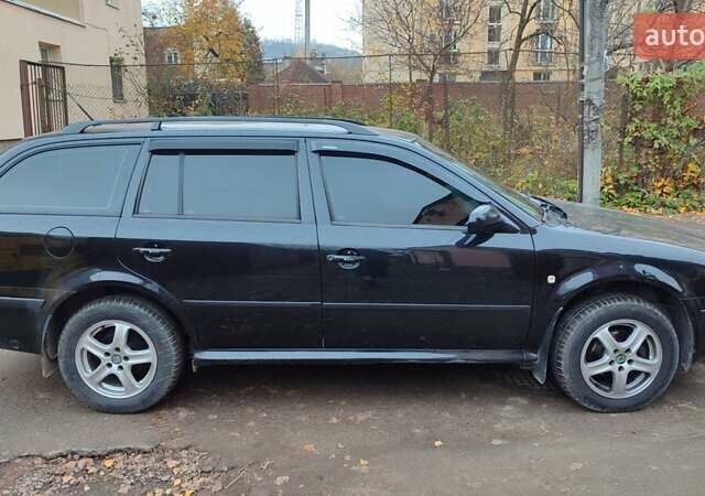 Черный Шкода Октавия, объемом двигателя 1.6 л и пробегом 200 тыс. км за 5500 $, фото 10 на Automoto.ua