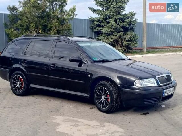 Черный Шкода Октавия, объемом двигателя 1.6 л и пробегом 201 тыс. км за 5800 $, фото 6 на Automoto.ua